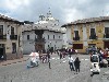 Domes and bell towers dominate the colonial buildings of Quito