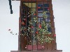 Flower pot adorning a window