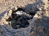 Close up view of a small crater