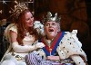 Queen Marie, Lauren Ambrose, attempts to cheer up the dying King.