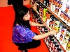The artist Vanda Daftari stocking the shelves.