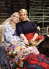 (L to R) Sarah deLima and Leigh Barrett comfort each other as Edith and Little Edie