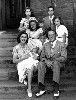 jackie in the back row with her mother, family, and step father Hugh D. Auchincloss.