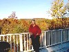 Judy and the exquisite view from her home in Bradford, New Hampshire. Photo by Joy M. Joslin.