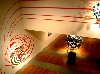 The abstract painting by Sean Foley extends onto the walls.