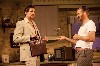 Lee(Paul Sparks) pitches his story to Kimmer.