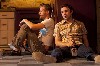 Austin (Nate Corddry) and Lee get down and dirty.