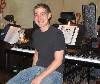 Brian at a keyboard, from 2007. From his personal collection.
