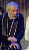 Dennis Krausnick as the Archbishop tries to hear Noriega&rsquo;s confession.