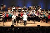 Sir James and a gaggle of young flute players in a world premiere. (Scott)