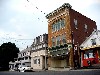 The building that includes Greylock Arts Gallery rises over the other buildings on Summer Street. Photo: Greylock Arts.
