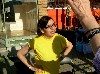 Marianne Petit wearing a yellow T-shirt in front of Greylock Arts during a summer festival. Photo Giuliano.