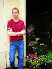 John Lisee the photographer in front of Stone Soup Cafe in Adams. Astrid Hiemer photo.