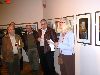 Event Chair, Jane Hudson, reads from a long list of credits during the opening reception.