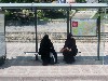 At the bus stop