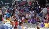 The Annual Eagle Street Beach Party organized by Eric Rudd is a big hit that gets city help.