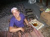 Shepherd&rsquo;s wife with tray of bread and honey