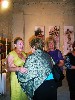 Two women from Paraza greeting each other and Christine.