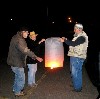 Ralph helping the Jewetts to launch their lantern.