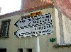 Signs to neighboring villages.