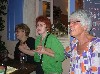 Dorothea, Astrid and a neighbor/ host, Annaben enjoying the music.