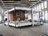The upside down Mies house under construction.