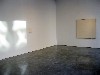 The play of light in an exhibition of paintings by Robert Ryman.