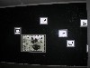 A wall of light boxes by Xun.