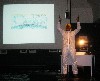 At the conclusion of the performance the artist stood under a dripping paint can.