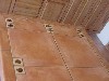 A section of tile counter tops with accent tiles.