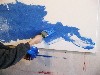 He wants to paint a solid blue background.