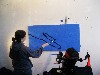 Applying a black line using a narrowed brush.