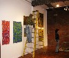 Installing work in the exhibition.