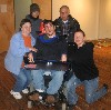 A.J. with his family, from left, Mom, Jane Ellen DeSomma, Dad and curator, Julie Seitel. Giuliano photos.