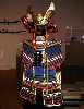 You can climb steps to look through the mask of this samurai outfit.