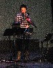 Demonstrating her electronic violin.