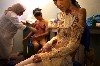 Sinclair documented women in the primitive burn clinic.