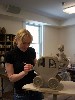 Grimm working on her most intricate sculpture.
