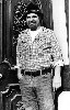 Charles Plymell at the Central National Bank, Cherry Valley, NY, 1975.