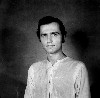 Gerard Malanga in a local Tibetan photo shop, Dharamsala, India, where he was studying Tibetan Law & Philosophy with one of the Dalai Lama's teachers. Summer 1972.  (c) Gerard Malanga.