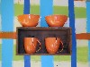 Artfully broken mugs.
