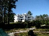 A view from the gardens reveals the articulated masses of the design.