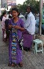 Burmese put thanakha yellow paste on their faces as a form of sun block
