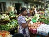 Eggs share the stand with vegetables