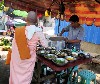 A nun receiving her daily food
