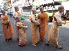 Novice monks in food line
