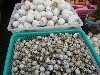 Quail eggs (foreground) and lime-preserved eggs