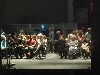 Reflection of the audience in the mirrored stage of the Cube
