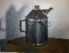 The oil can casts an interesting shadow.