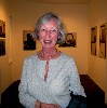 Orthofer posed with the work in the college gallery.
